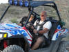 Neighbor Rick with his son Taran in his Polaris RZR (Razor)  He gave me a ride and ... it all started.  Tks Rick!