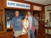 John and Jesse pose under the sign, which he still HAS NOT seen