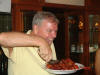 Before anyone can lift a finger, Gilmore glomps onto the plate of ribs