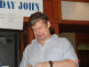 In the meantime John has spent a very long time opening his VERY WELL wrapped gift due to his near starvation