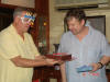 As a finale Mike presents John with a lovely birthday cake, while wearing his magic glasses