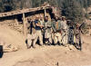 Neighborhood group inspecting a lovely mountain retreat.
