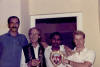 Haji our house cook, Bob Brenner, unidentified help, and Scott Brenner known then as Scotty, but not now.  Grew out of it I guess.